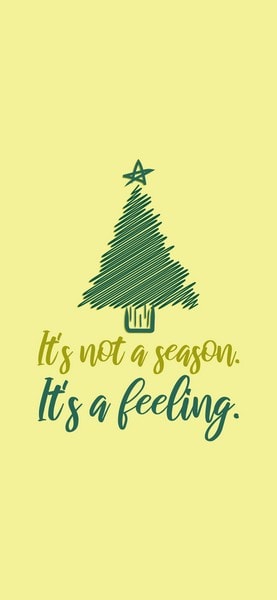 Christmas Wallpaper with Quote: "It's not a season. It's a feeling."